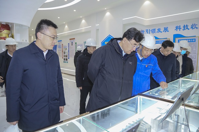 新疆生产建设兵团副司令哈增友一行到亚洲体育登录平台下载集团考察交流