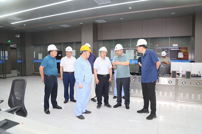 河南省经济战略学会会长吴孟铎一行到亚洲体育登录平台下载集团调研