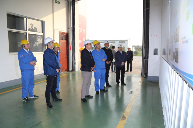 河南金马能源行政总裁王明忠一行到亚洲体育登录平台下载集团考察